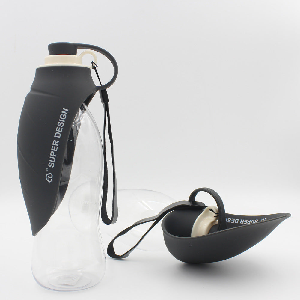 Black FlipSip 580ml pet water bottle with one-hand flip lid, ideal for walks and outdoor adventures
