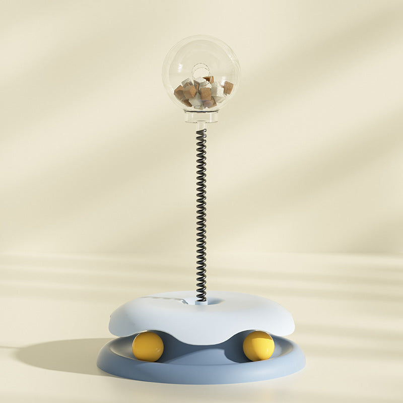 Blue SpringSnack 2-in-1 spring toy for cats — front view showing treat container on spring stem

