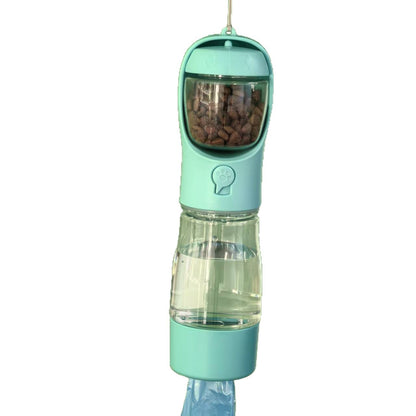 Dog drinking from 3-in-1 pet travel cup on outdoor walk