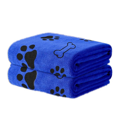 FluffDry blue pet towel draped open showing full size — lightweight and lint-free microfiber

