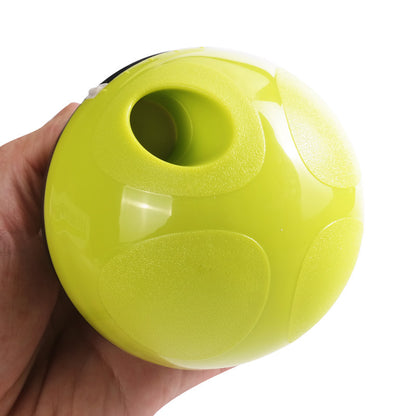 RollReward treat dispenser ball in use with dog rolling toy — slow feeder enrichment ball for dogs and cats

