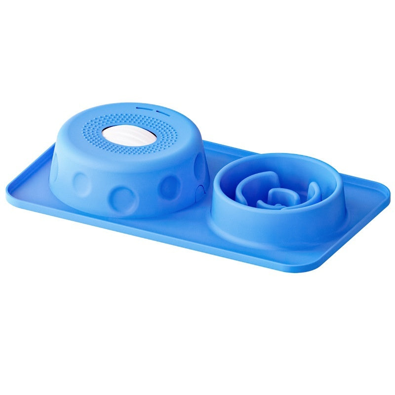 SlowSip silicone slow feeder lick bowl in use with dog licking wet food — calm enrichment and digestion aid

