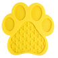 Yellow LickEase silicone lick mat paw shape for cats and small animals — treat enrichment mat

