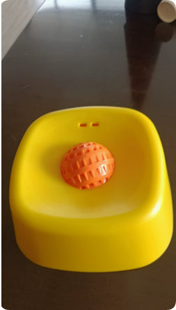 Yellow with orange balls slow-feed lick bowl for dogs and cats